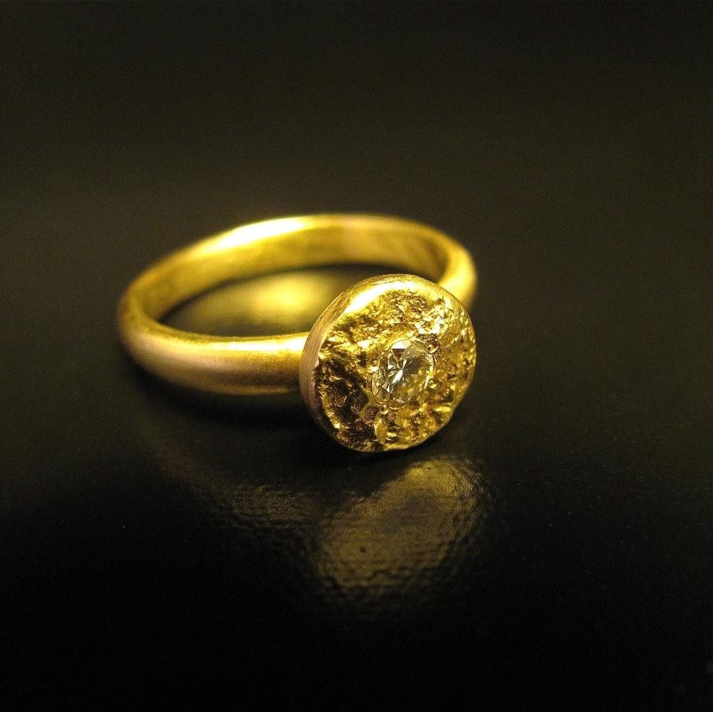 14K solid yellow gold ring with 0.16ct' Diamond.